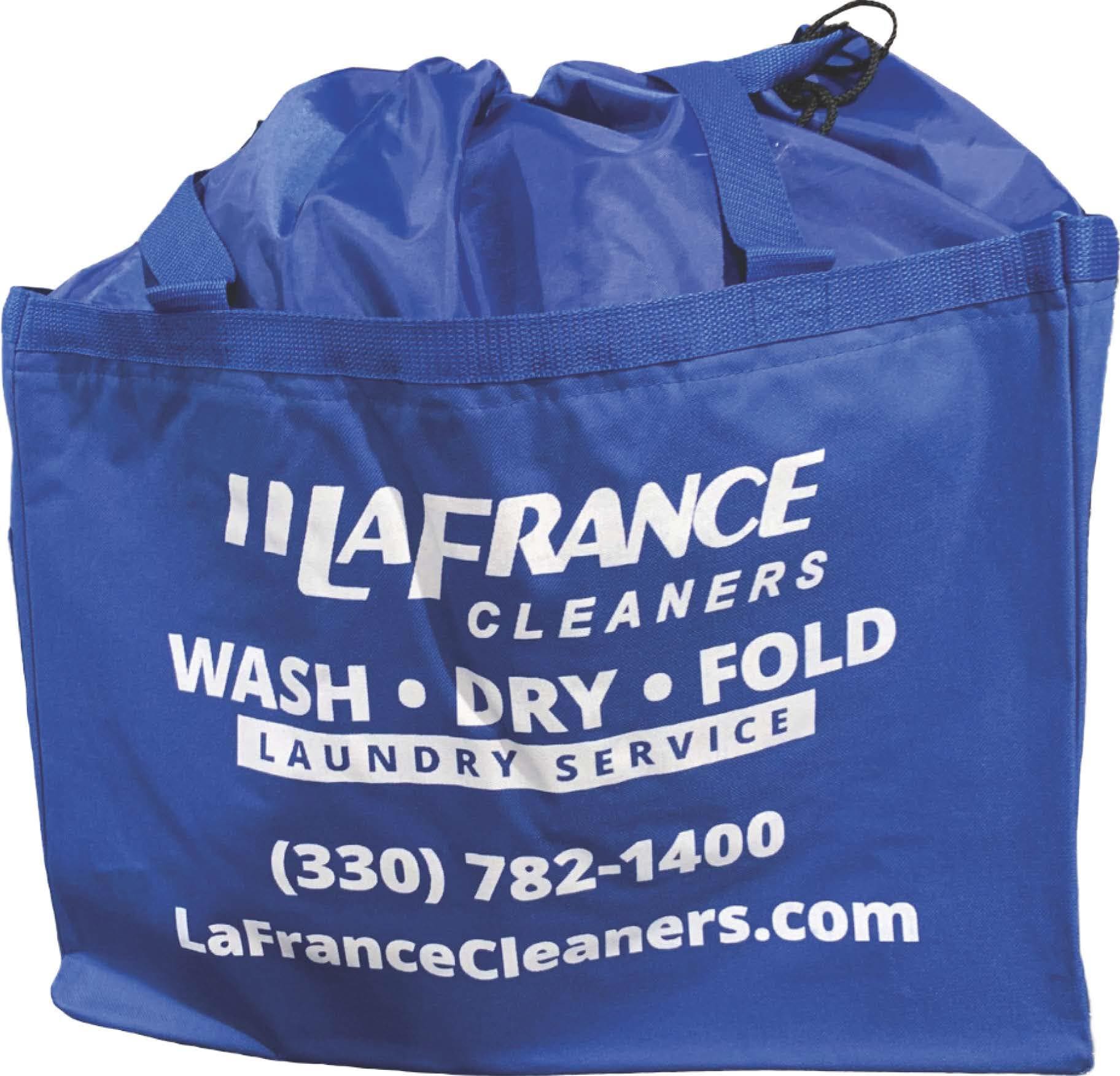 A blue laundry bag with handles displays &ldquo;LaFrance Cleaners Wash Dry Fold Laundry Service&rdquo; and contact information in white text.
